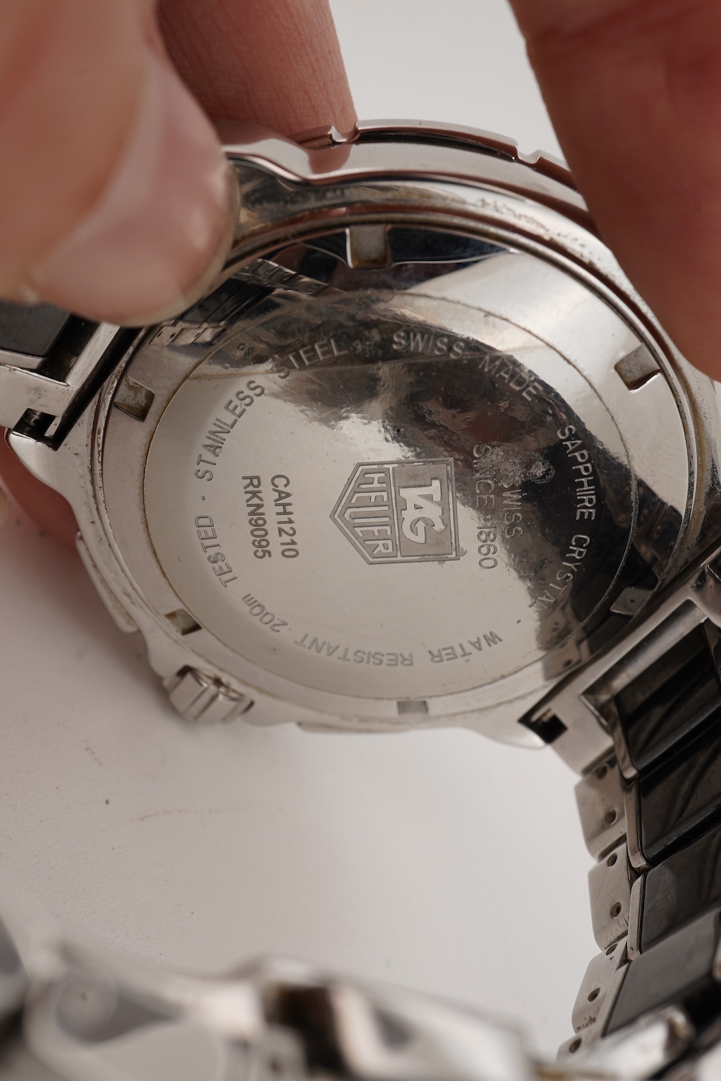 A gentleman's 2011 stainless steel TAG Heuer Formula One quartz chronograph wrist watch, on a stainless steel Tag Heuer bracelet